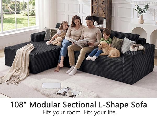 Black modular sectional L-shaped sofa in corduroy with chaise and cushions