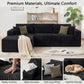 Black corduroy modular sectional sofa with throw pillows and wide armrests