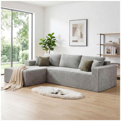 Grey corduroy modular L-shaped sectional sofa with deep chaise and scatter cushions