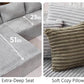 Gray corduroy sectional sofa close-up: extra-wide armrests and deep seat cushions