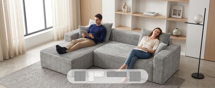 Gray corduroy modular sectional sofa with extended chaise and cushioned armrests
