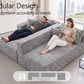 Gray modular sectional sofa with oversized chaise and deep, cushioned seating