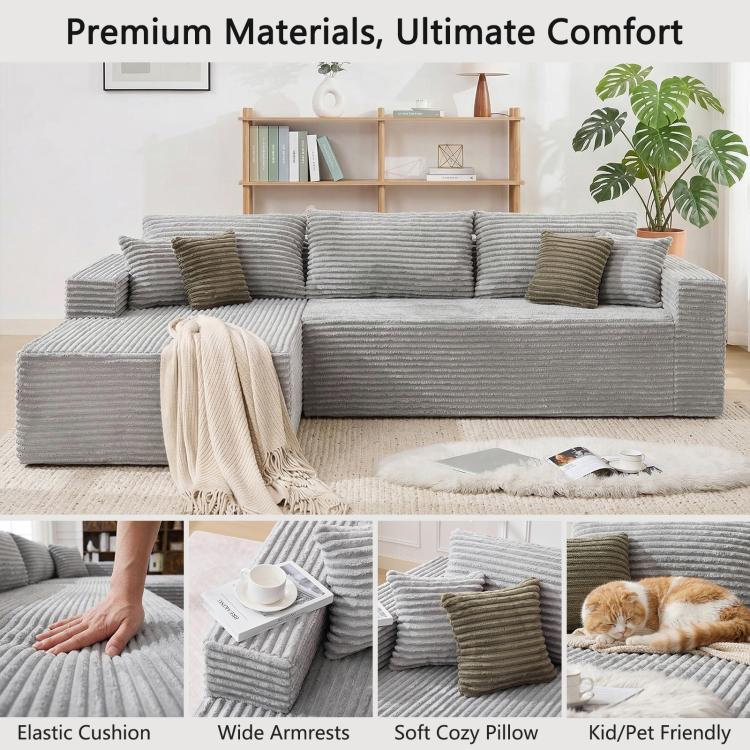 Grey corduroy modular sectional sofa with oversized chaise and matching accent pillows