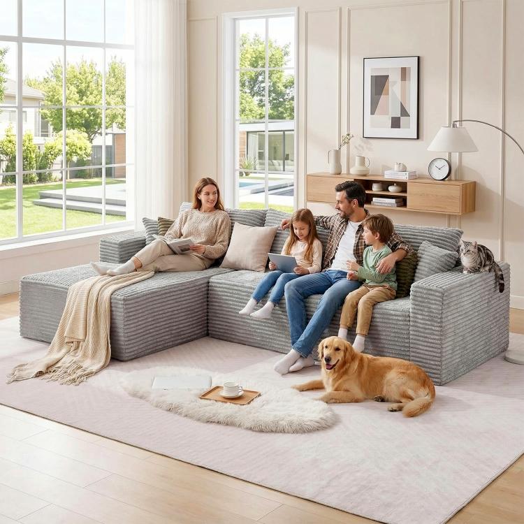 Grey corduroy L-shaped sectional sofa with deep chaise and large cushions