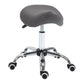 Gray ergonomic saddle stool with cushioned seat and chrome rolling base