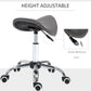 Gray saddle stool with height-adjustable hydraulic post and rolling chrome base