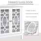 Close view of white framed glass cabinet doors with arched and diamond decorative inserts