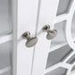 Stainless-finish round knobs on white double cabinet glass doors