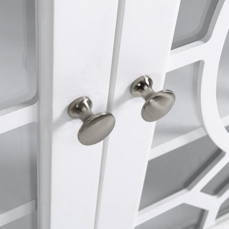 Stainless-finish round knobs on white double cabinet glass doors