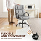 Light grey high-back office chair with wide seat, padded armrests, and caster wheels
