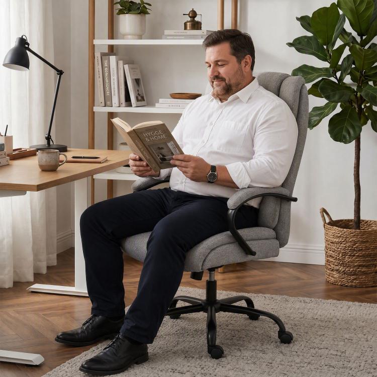 Light grey high-back executive office chair with padded arms and swivel base
