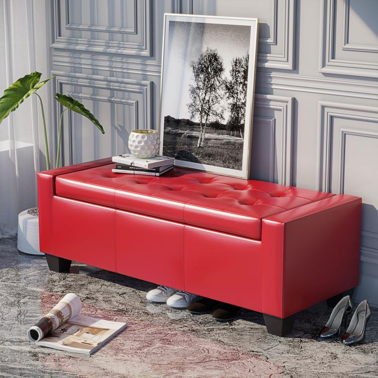 Red storage ottoman bench seat with tufted lid and low black feet