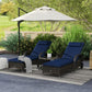 Outdoor set of 2 reclining chaise lounge chairs with blue seat cushions and dark woven bases