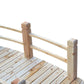 Wooden bridge railing post and smooth top rail over plank deck