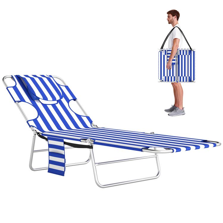 Blue striped tanning lounge chair with face pillow and reclining metal frame