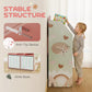 Pink kids bookshelf with stable base design and two fabric storage drawers