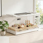 Transparent small animal enclosure with top mesh vent and front doorway