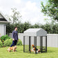 Outdoor dog kennel with white roof and black welded wire fence, yard playpen enclosure
