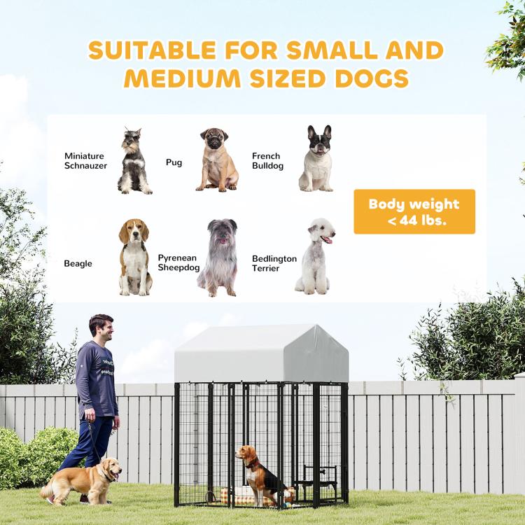 Outdoor dog kennel with white roof and black welded wire fence for small to medium dogs