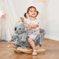 Gray plush koala rocking horse with child sitting on the wooden rockers