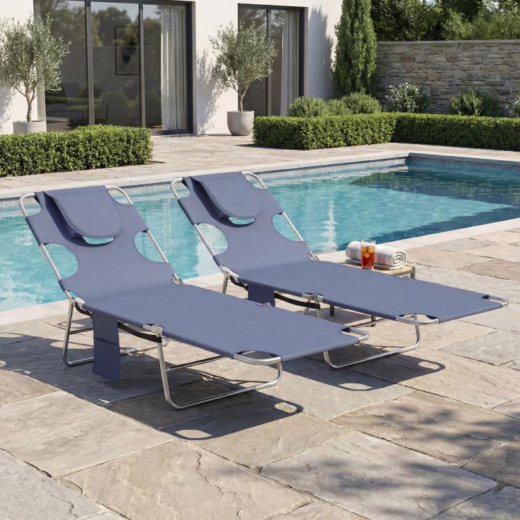 Two-pack dark blue adjustable chaise lounges with face openings, padded headrests, and steel frames