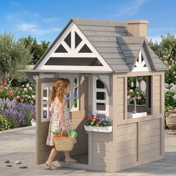 Wooden playhouse with gray roof, porch counter, sink detail, and open window panels