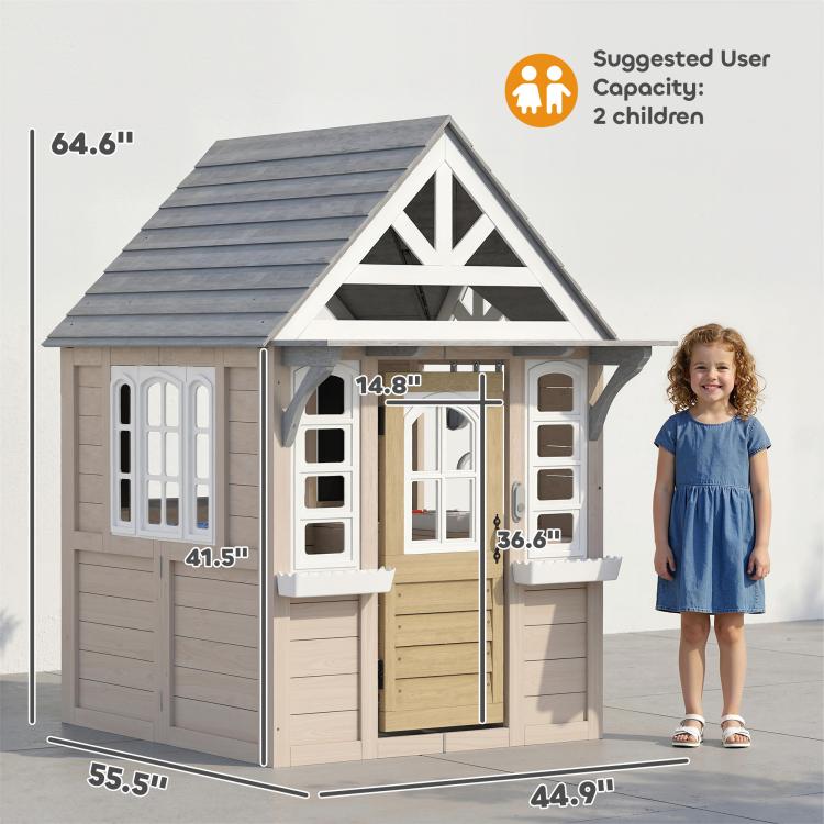 Wooden kids playhouse with gray roof, arched front door, and window panels