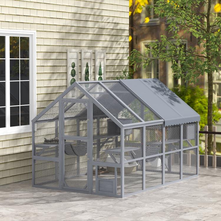 Gray outdoor cat enclosure with waterproof roof, mesh walls, and multi-level platform space