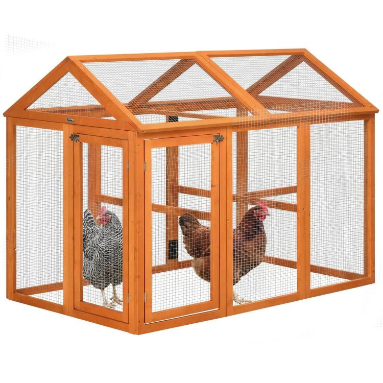 Orange wooden chicken run with wire mesh panels and side doors, exterior end view