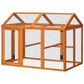Orange wooden chicken run with wire mesh sides and interior wooden perch bars