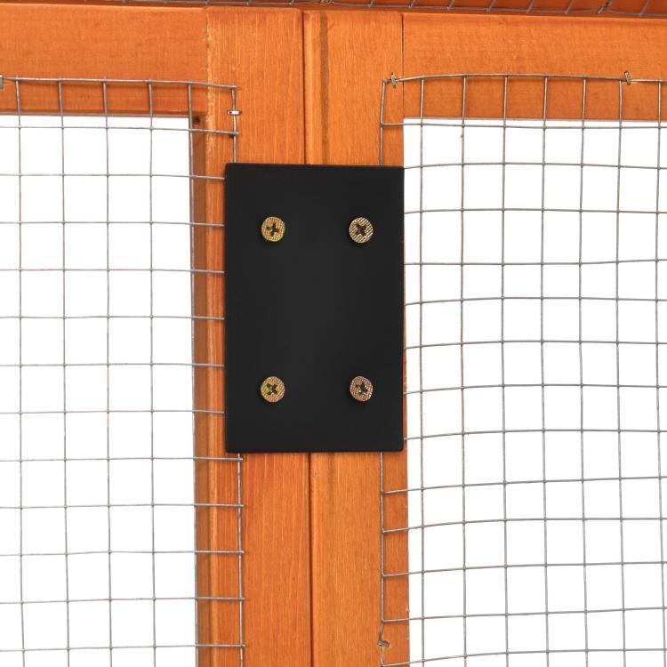 Orange wooden chicken run panel with black access door and wire mesh