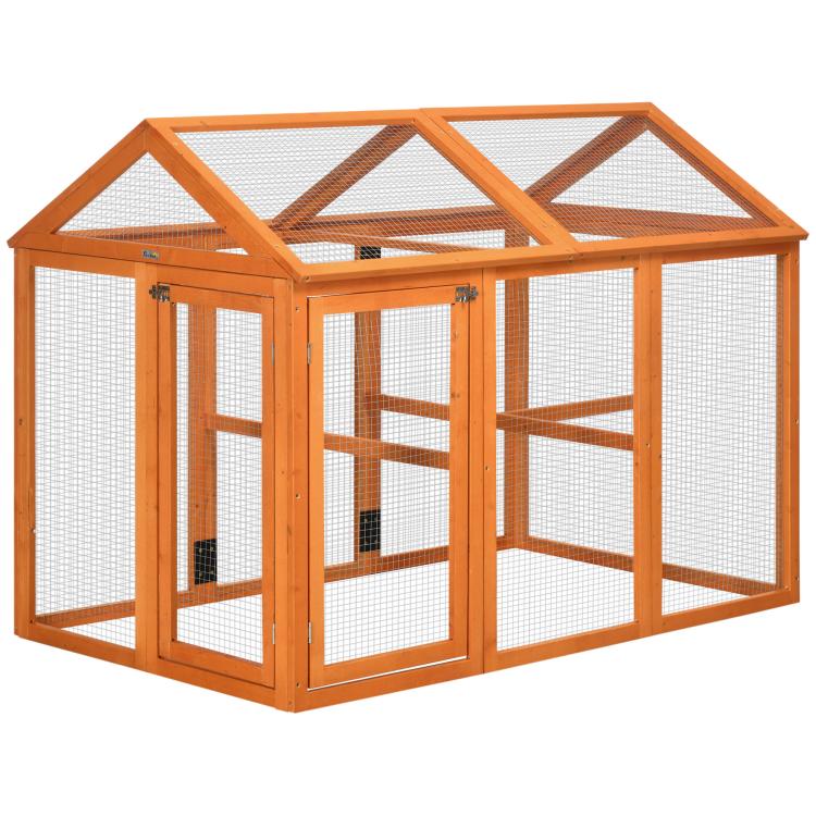 Orange wooden chicken run with wire mesh enclosure and perches