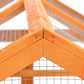 Orange wooden chicken run corner joint close-up with wire mesh roof support