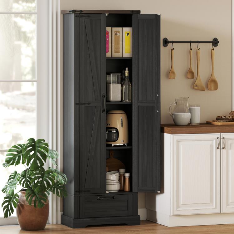 Black pantry cabinet with barn doors open, shelving inside and lower drawer unit