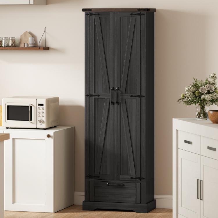 Black pantry cabinet with barn doors closed and lower drawer, front view