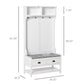 White hall tree bench unit with top shelves, coat hooks, padded seat, and two drawers