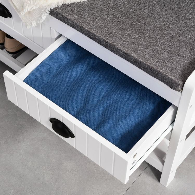 White hall tree bench drawer open, showing deep storage space under the padded seat