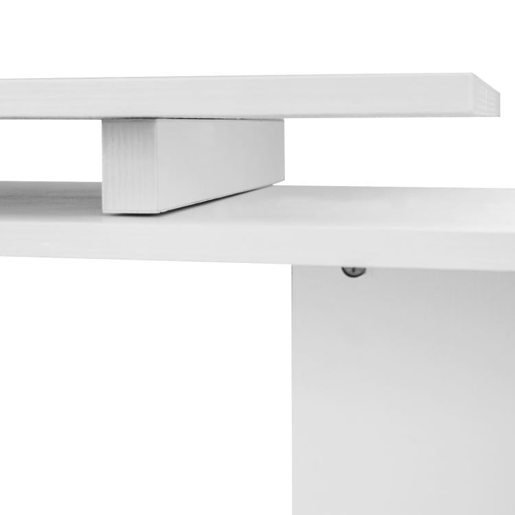 Close-up of white desk tabletop edge and central support leg