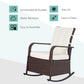 Beige-cushioned rattan rocking recliner with curved armrests and footrest
