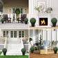 Artificial topiary balls in planters flanking a patio entrance