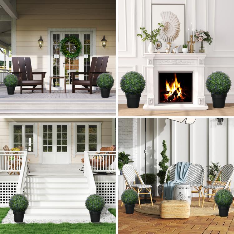 Artificial topiary balls in planters flanking a patio entrance