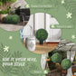Artificial topiary balls with green foliage and purple blooms for display in spaces