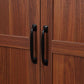Brown freestanding kitchen pantry cabinet with black recessed door handles