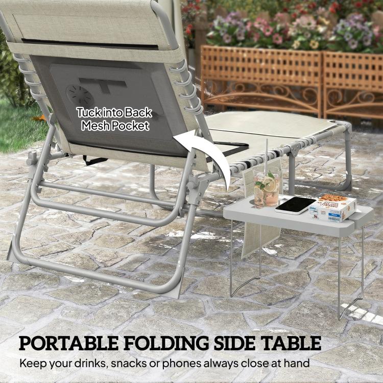 Beige folding lounge chair with mesh pocket back and portable side table