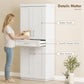 White pantry cabinet detail view with shaker doors, smooth drawer slides, and accents