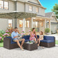 Outdoor patio conversation set with blue cushioned sectional and glass-topped coffee table