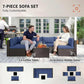 7-piece outdoor sofa set with blue cushions and dark wicker coffee table