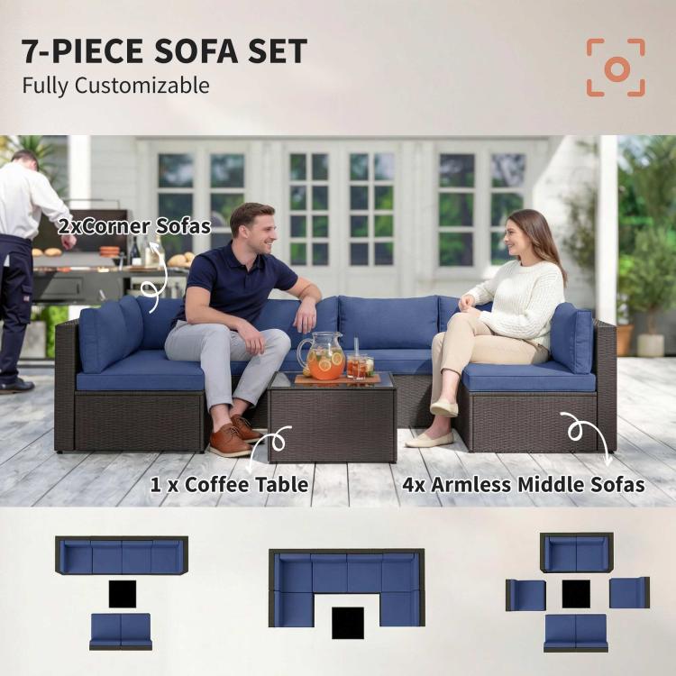 7-piece outdoor sofa set with blue cushions and dark wicker coffee table