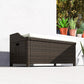 Outdoor wicker storage bench with storage and white cushion, side view
