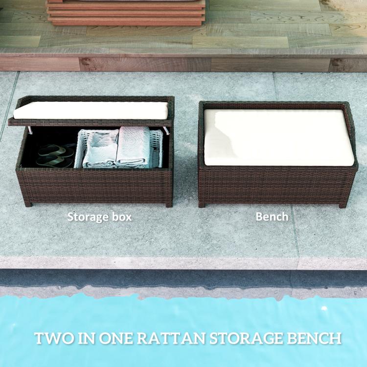 Outdoor wicker storage bench with lid open, showing empty storage compartment and cushion